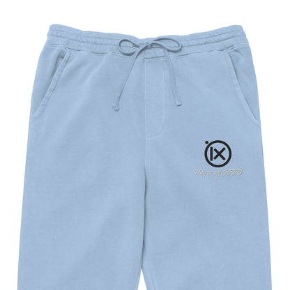 Vintage pigment sweatpants in light blue with drawstring waistband, side logo, cuffed hems